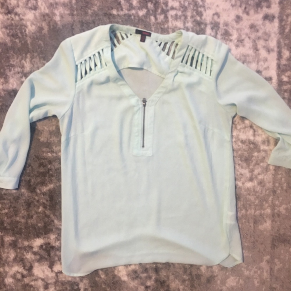 Mint blouse with cutouts